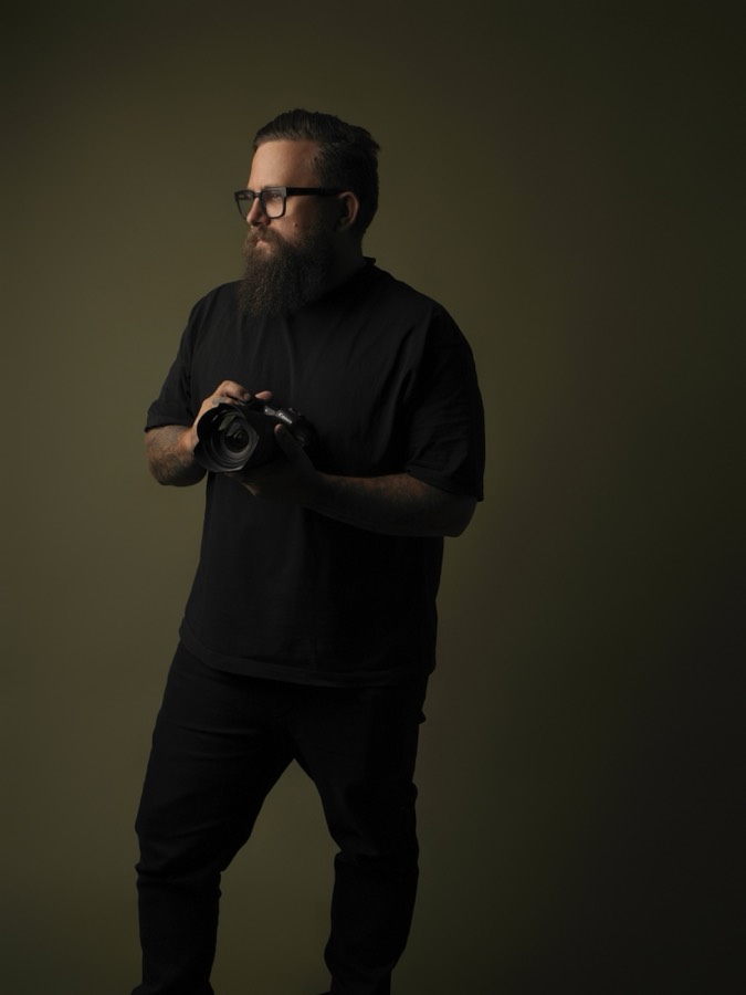 Ben McCoy in his Perth studio, camera in hand
